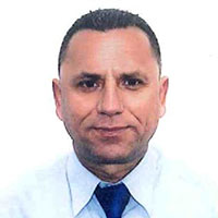 Mr. Ardjan Caushi